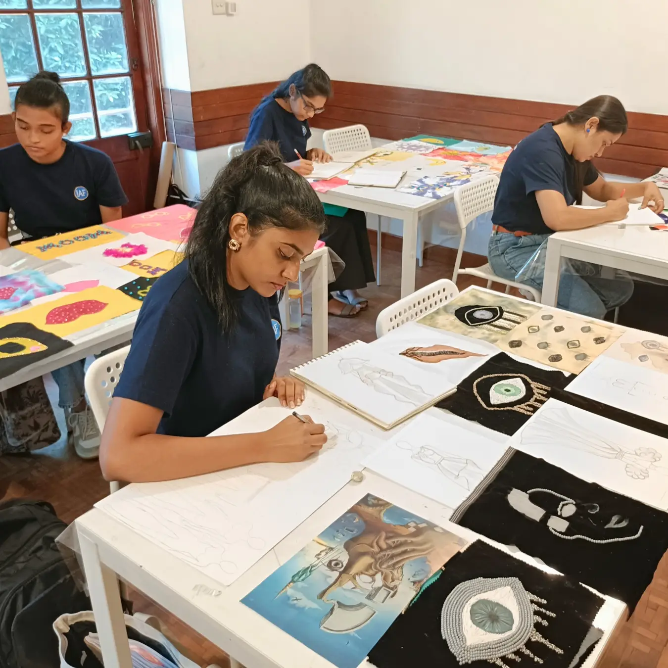 iaf student learning fashion design diploma course